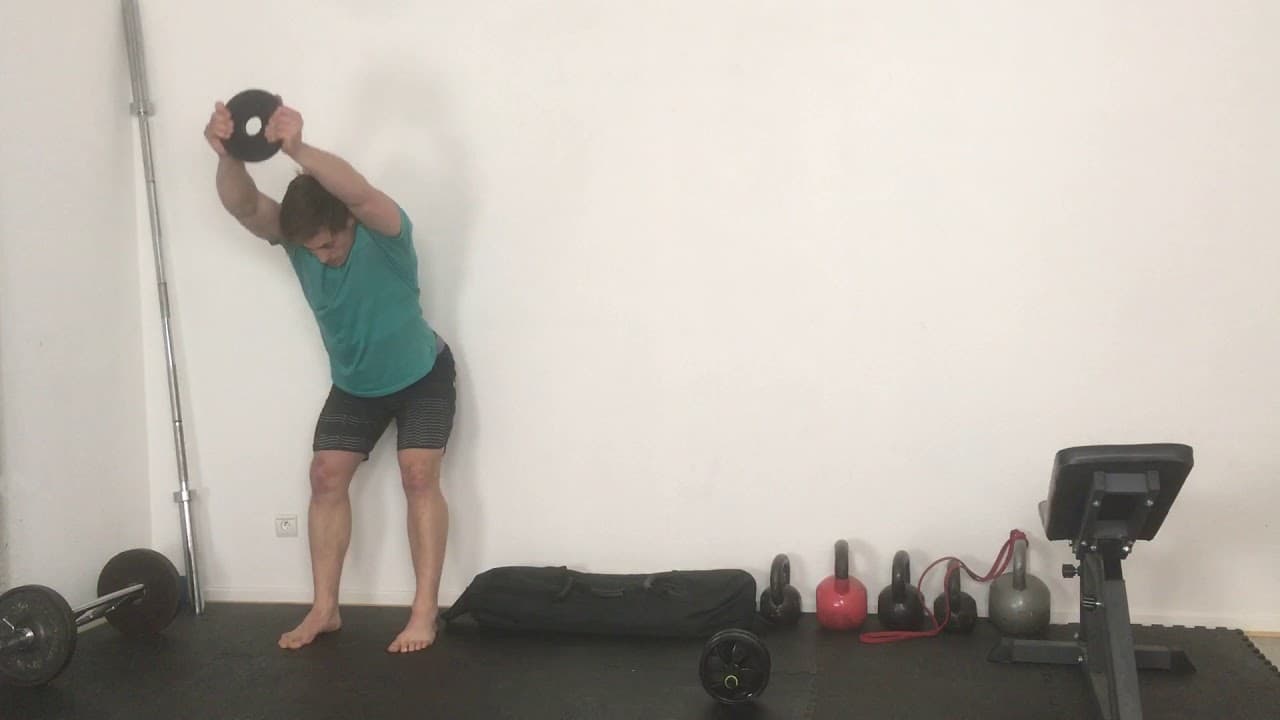 Co-contraction A.D au mur avec disque : Améliorez votre gainage