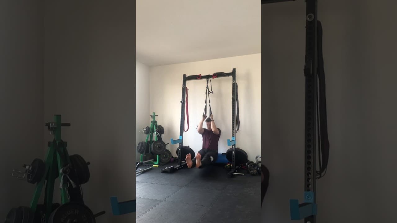 Maîtrisez le L-Sit Pull-Up avec des Sangles de Suspension